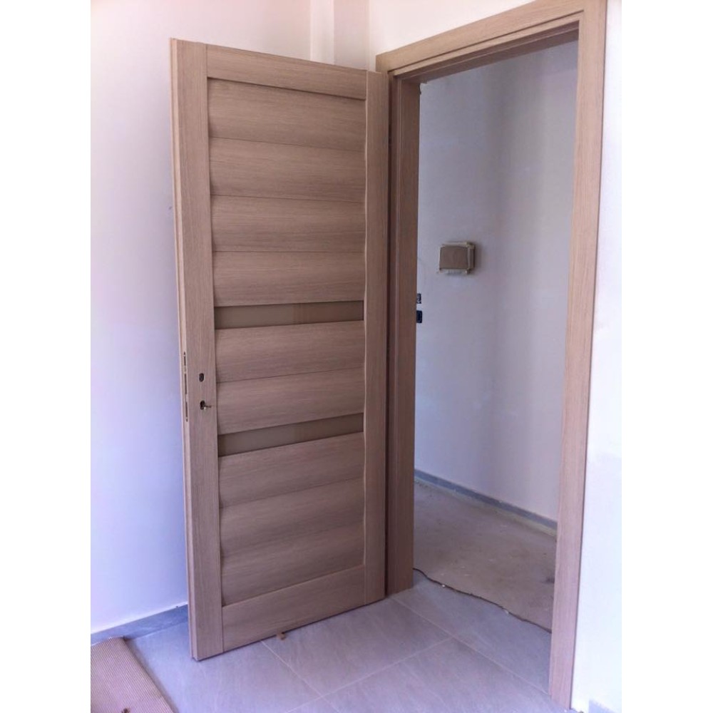 Εσωτερική πόρτα Καλλιθέα ταμπλαδωτή σε πολυτελή κατοικία Εσωτερική πόρτα Καλλιθέα ταμπλαδωτή σε πολυτελή κατοικία